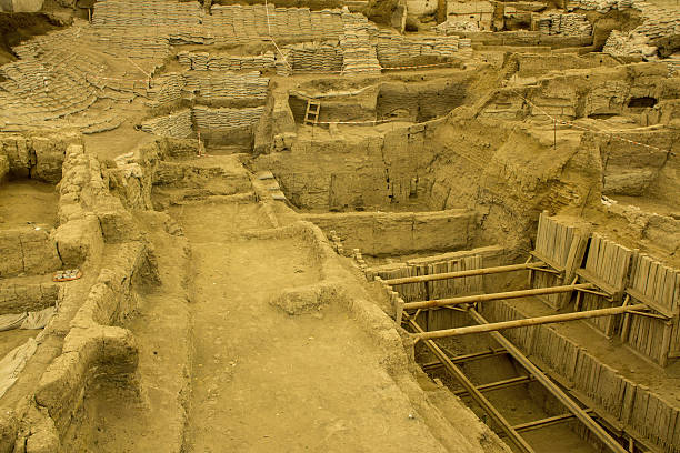 Catalhoyuk Çatalhöyük; also Çatal Höyük and Çatal Hüyük; çatal is Turkish for "fork", höyük for ("mound") was a very large Neolithic and Chalcolithic proto-city settlement in southern Anatolia, which existed from approximately 7500 BC to 5700 BC, and flourished around 7000BC. It is the largest and best-preserved Neolithic site found to date. In July 2012, it was inscribed as a UNESCO World Heritage Site. çatalhöyük stock pictures, royalty-free photos & images