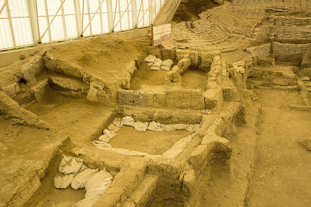 Catalhoyuk Çatalhöyük; also Çatal Höyük and Çatal Hüyük; çatal is Turkish for "fork", höyük for ("mound") was a very large Neolithic and Chalcolithic proto-city settlement in southern Anatolia, which existed from approximately 7500 BC to 5700 BC, and flourished around 7000BC. It is the largest and best-preserved Neolithic site found to date. In July 2012, it was inscribed as a UNESCO World Heritage Site. çatalhöyük stock pictures, royalty-free photos & images