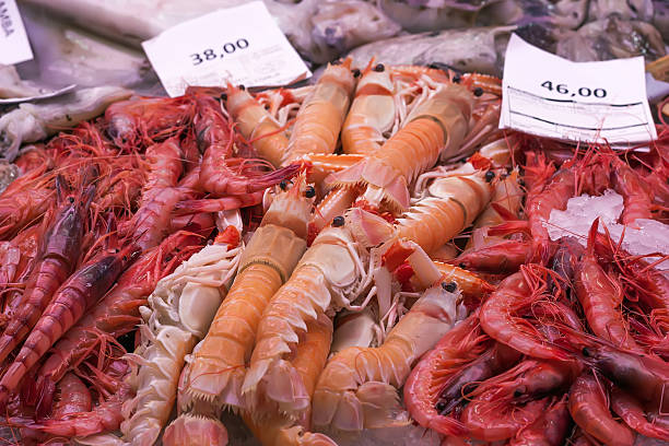 istock Langoustines and prawns at fish market 487251647