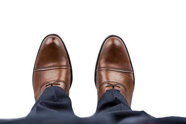 Business Man Brown Shoes Top View Business Man Brown Shoes Top View brogue photos stock pictures, royalty-free photos & images