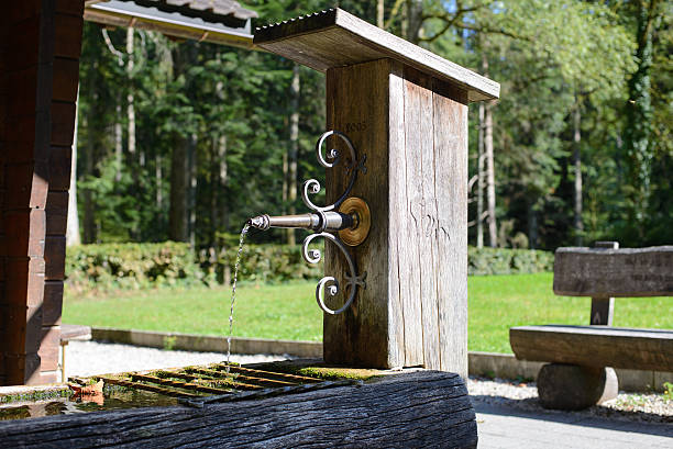 istock Old water well of wood 487254132