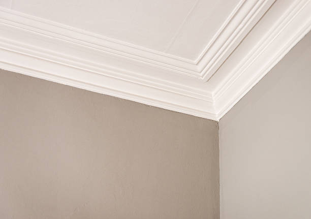 Simple Ceiling Cornice A simple interior cornice between wall and ceiling. architectural cornice stock pictures, royalty-free photos & images