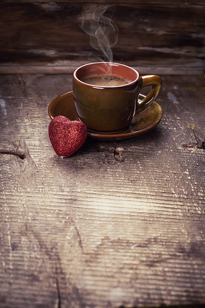 istock Cup of coffee and red heart 487254173