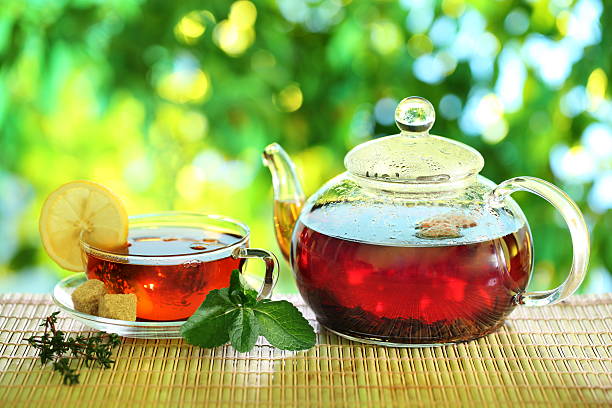istock Cup of tea and teapot. 487254311