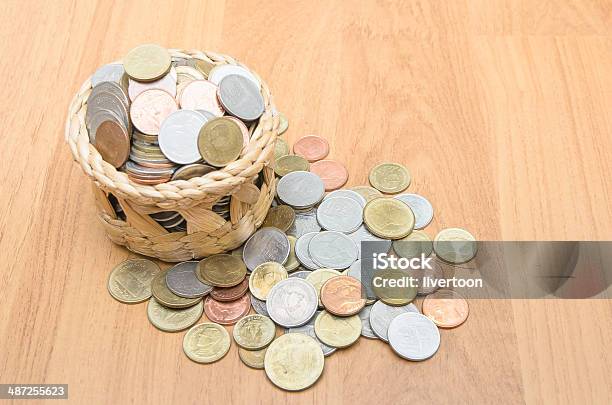 Thai Baht Coins In Basket On Wooden Floor Stock Photo - Download Image Now - Borrowing, Business, Charitable Donation