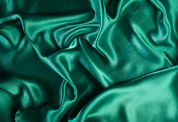 istock Shiny green satin fabric 487256689