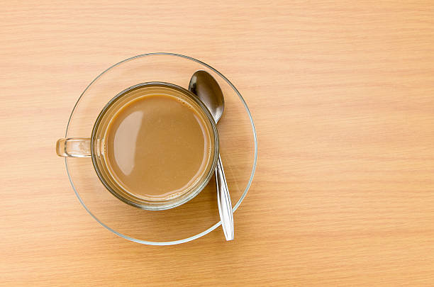 istock top view of hot Coffee on the wooden table 487257687