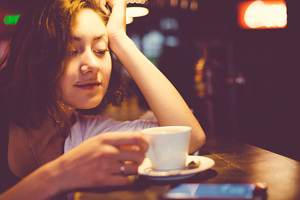 istock Dreamy girl in a cafe 487260436