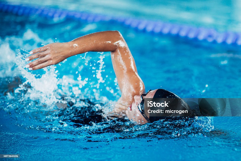 Front crawl swimmer Female swimming front crawl. Swimming Stock Photo