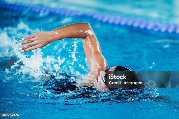 Front Crawl Swimmer Stock Photo - Download Image Now - Swimming, Swimming Pool, Women