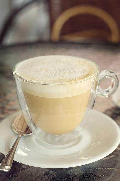 istock cup of cappuccino on the table in cafe 487270458