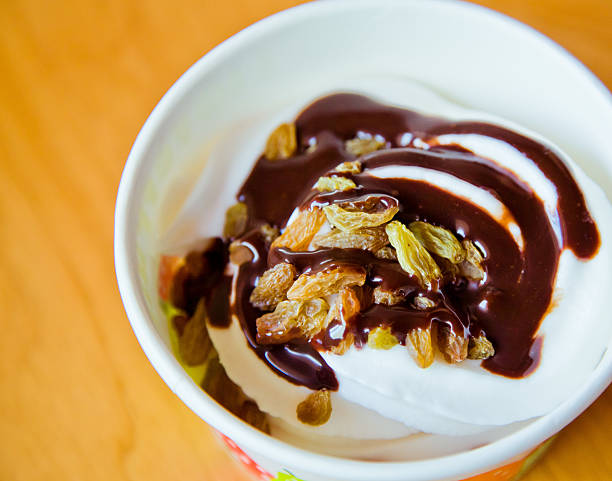 istock Raisin ice cream with chocolate and sauce 487271291