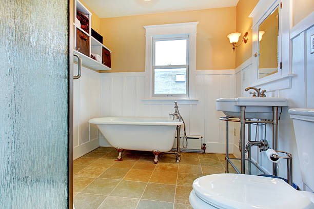 istock Bathroom with claw foot tub 487272097