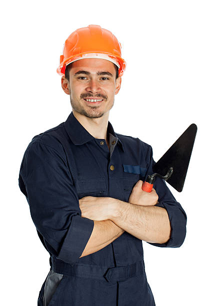 builder with trowel isolated on white background young worker standing with trowel isolated on white background bricklayer stock pictures, royalty-free photos & images