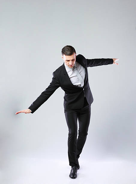 istock Businessman walking on invisible rope 487275033
