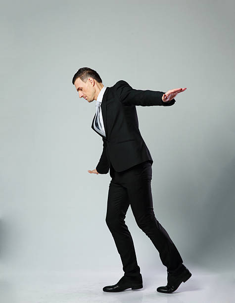 istock Businessman walking on invisible rope 487275057