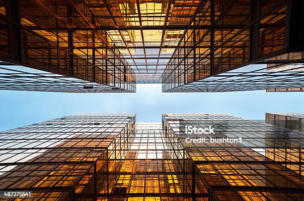 Symmetrical Mirrored Office Buildings Hong Kong Stock Photo - Download Image Now - Architecture, Backgrounds, Blue