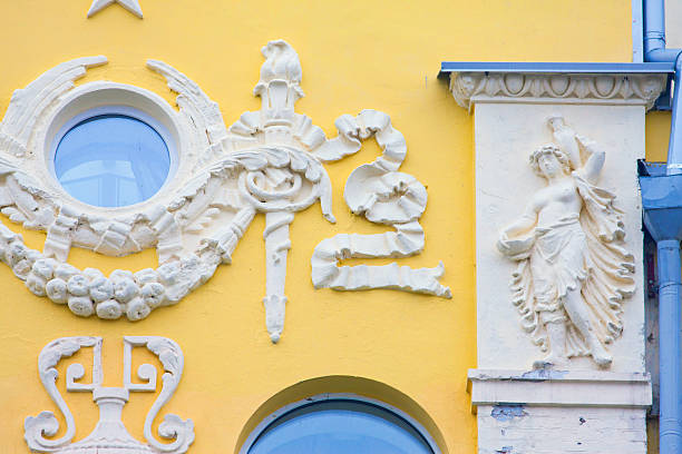 istock building with sculptured figures in Kiev 487276423