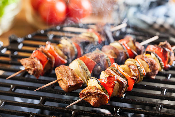 istock Grilling shashlik on barbecue grill 487277162