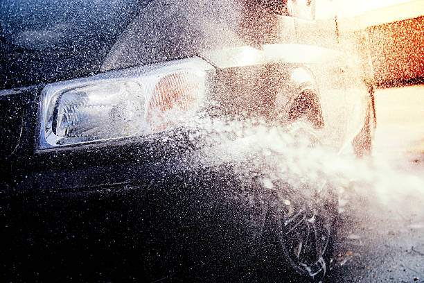 istock Washing car with water splash 487278072