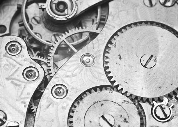 istock Black and white macro photo close-up view of metal clockwork 487291374