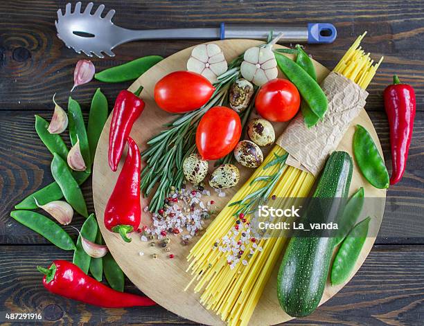 Ingredients For Cooking Pasta With Vegetables Stock Photo - Download Image Now - 2015, Backgrounds, Basil