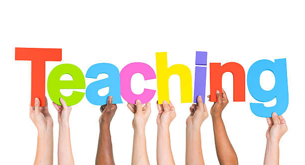 istock Group of Multiethnic Hands Holding Teaching 487296135