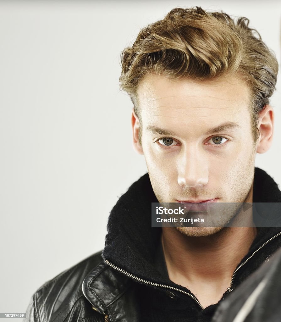 Young man studio shoot posing closeup Attractive young guy posing in studio 20-29 Years Stock Photo