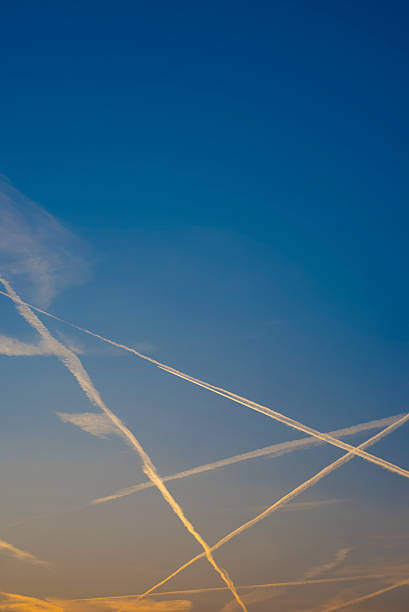 istock Airplane lines in the sky 487298508