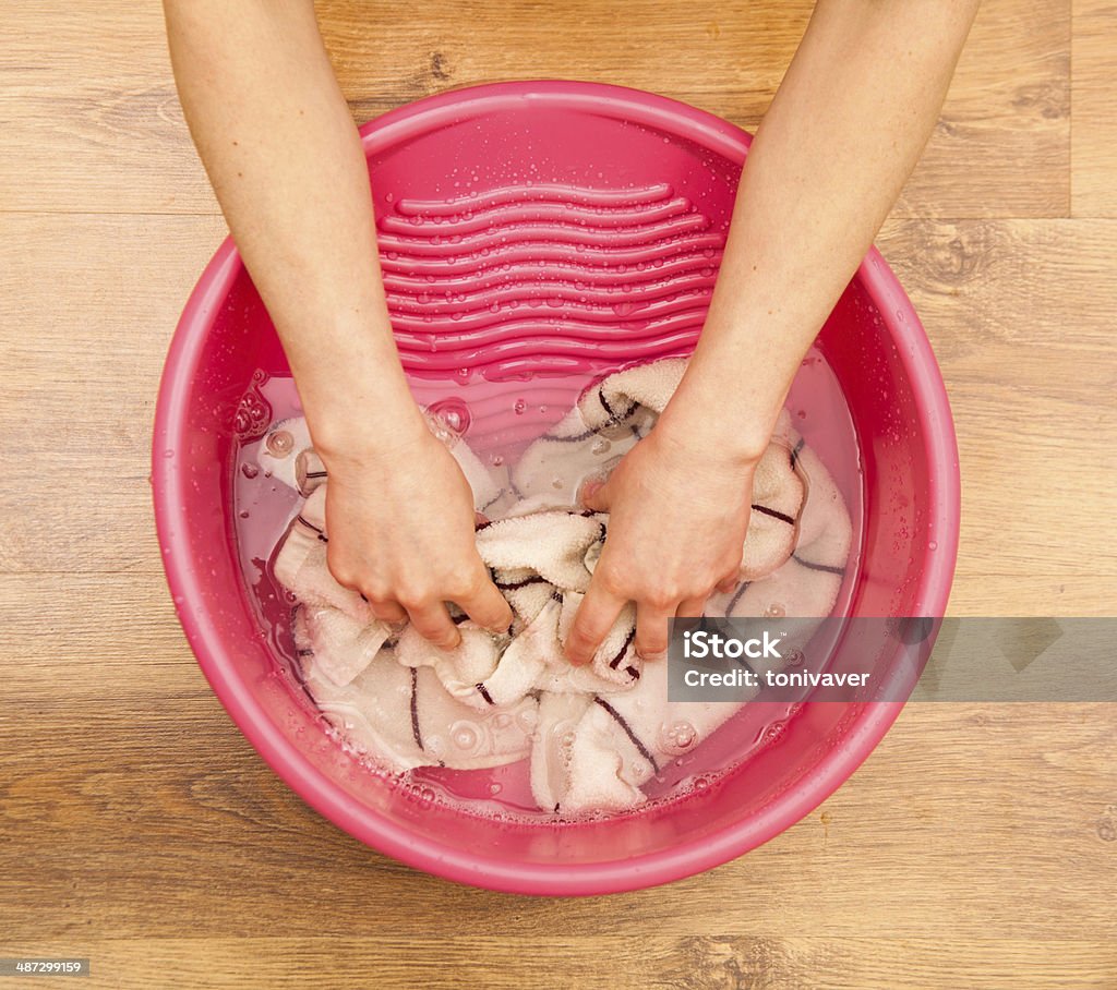 Hand wash Hand delicate washing of clothes. Clothing Stock Photo