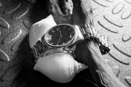 Classic watch on black Steel background, Black and whiteClassic watch on black Steel background
