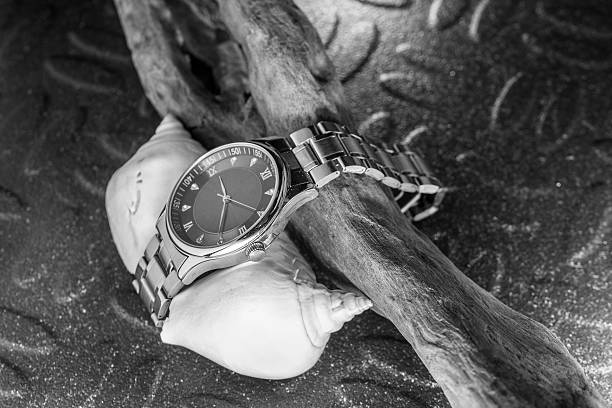 Classic watch on black Steel background, Black and whiteClassic watch on black Steel background, Black and whiteClassic watch on black Steel background