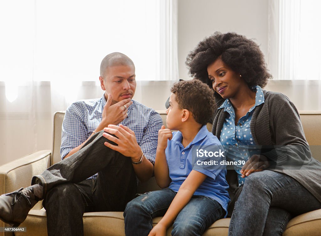 Facts of Life A couple having a "the talk" with their young son. Discussion Stock Photo