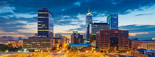 Indianapolis. Image of Indianapolis skyline at sunset. This is composite of five vertical images stitched together in photoshop. indianapolis photos stock pictures, royalty-free photos & images