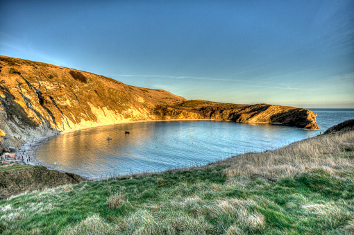 Lulworth Cove on a bright spring day.