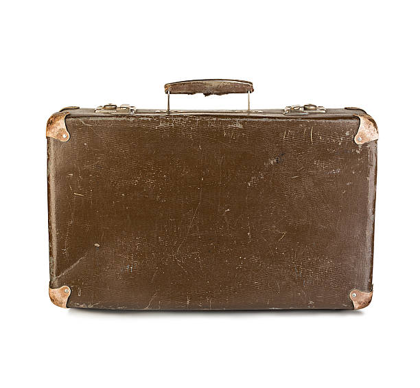 istock old suitcase close-up isolated on a white background 487317446