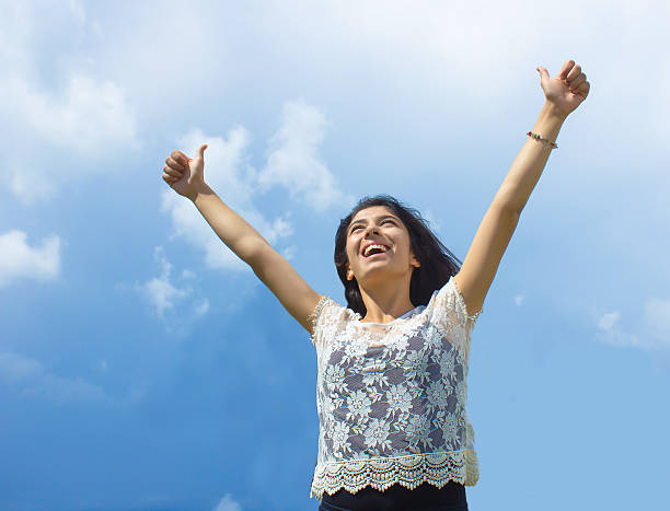 istock free young girls who dream and sky 487318156