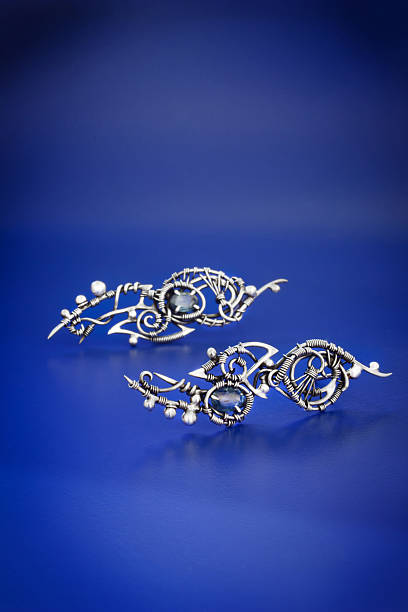 Silver blue sapphire wire wrap earrings stock photo