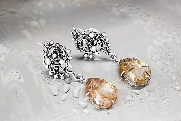 Silver drop earrings with rutile quartz-1 stock photo
