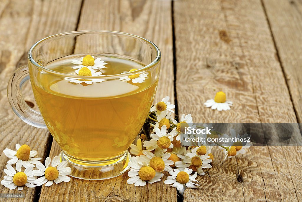 chamomile tea cup of chamomile tea with chamomile flowers Blossom Stock Photo