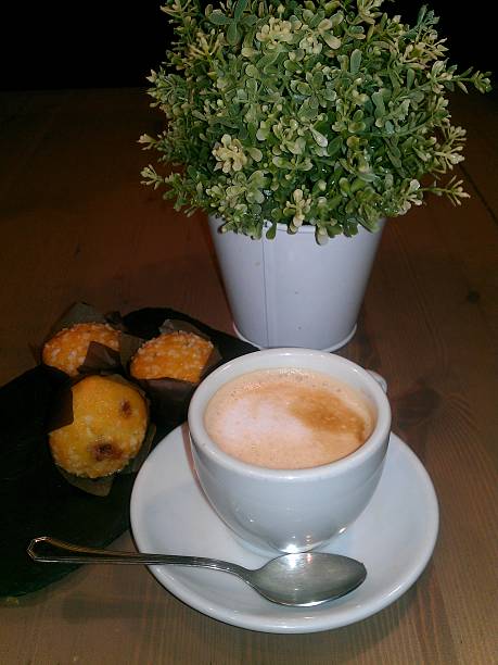 istock Cup of cappuccino and mufin 487327369
