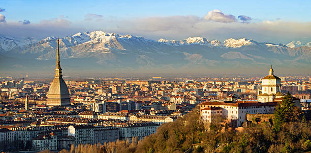 Turin (Torino), Mole Antonelliana and Alps Turin (Torino), Mole Antonelliana and Alps piedmont italy photos stock pictures, royalty-free photos & images