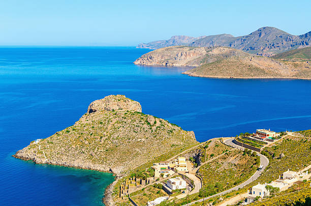 Peacful view on cozy green peninsula, Greece Peacful view on cozy green peninsula in day with clear blue sky of Kalymnos Greek island, Greece peacful stock pictures, royalty-free photos & images