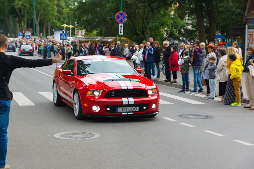 Palanga, Lithuania - August 01, 2015: movement of participants of American Spirit 2015 down the street cities of Palnga