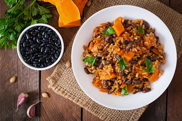 istock Mexican vegan vegetable pilaf with haricot beans and pumpkin 487334596
