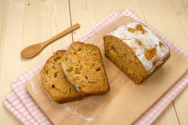 istock Fruit cake with two slices on a linen napkin 487335238