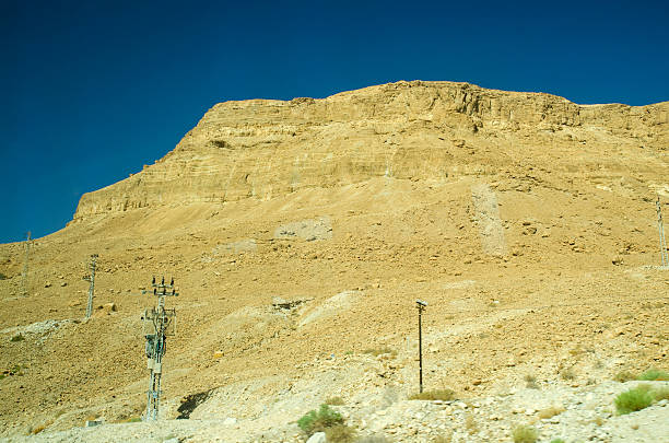 istock Israel desert with yellow stone mountains 487335792