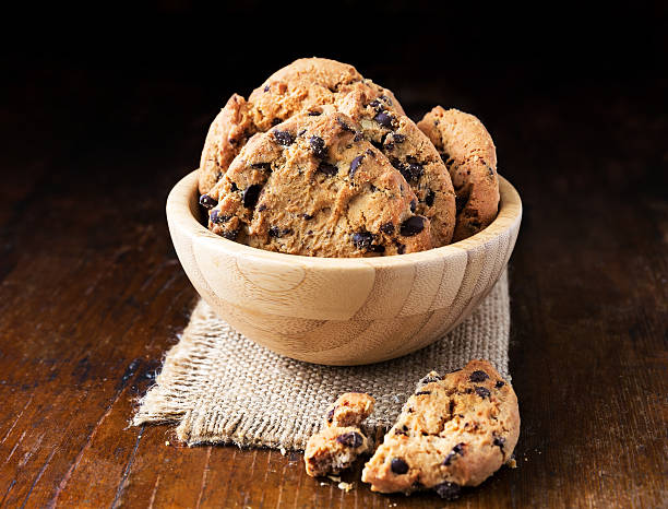 istock Chocolate chip cookies on old wooden table 487335846