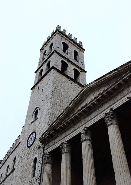 Temple of Minerva Temple of Minerva in Assisi, Umbria - Italy umbria architecture assisi corinthian stock pictures, royalty-free photos & images