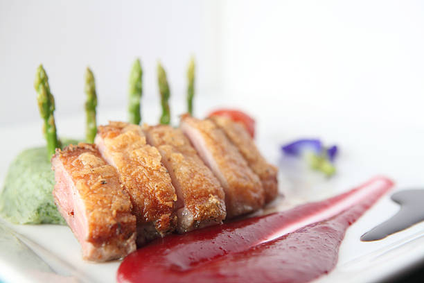 istock Roasted duck fillet with berry sauce 487348568